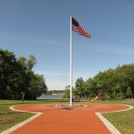 Flag pole surrounded by Bricks in Wakefield