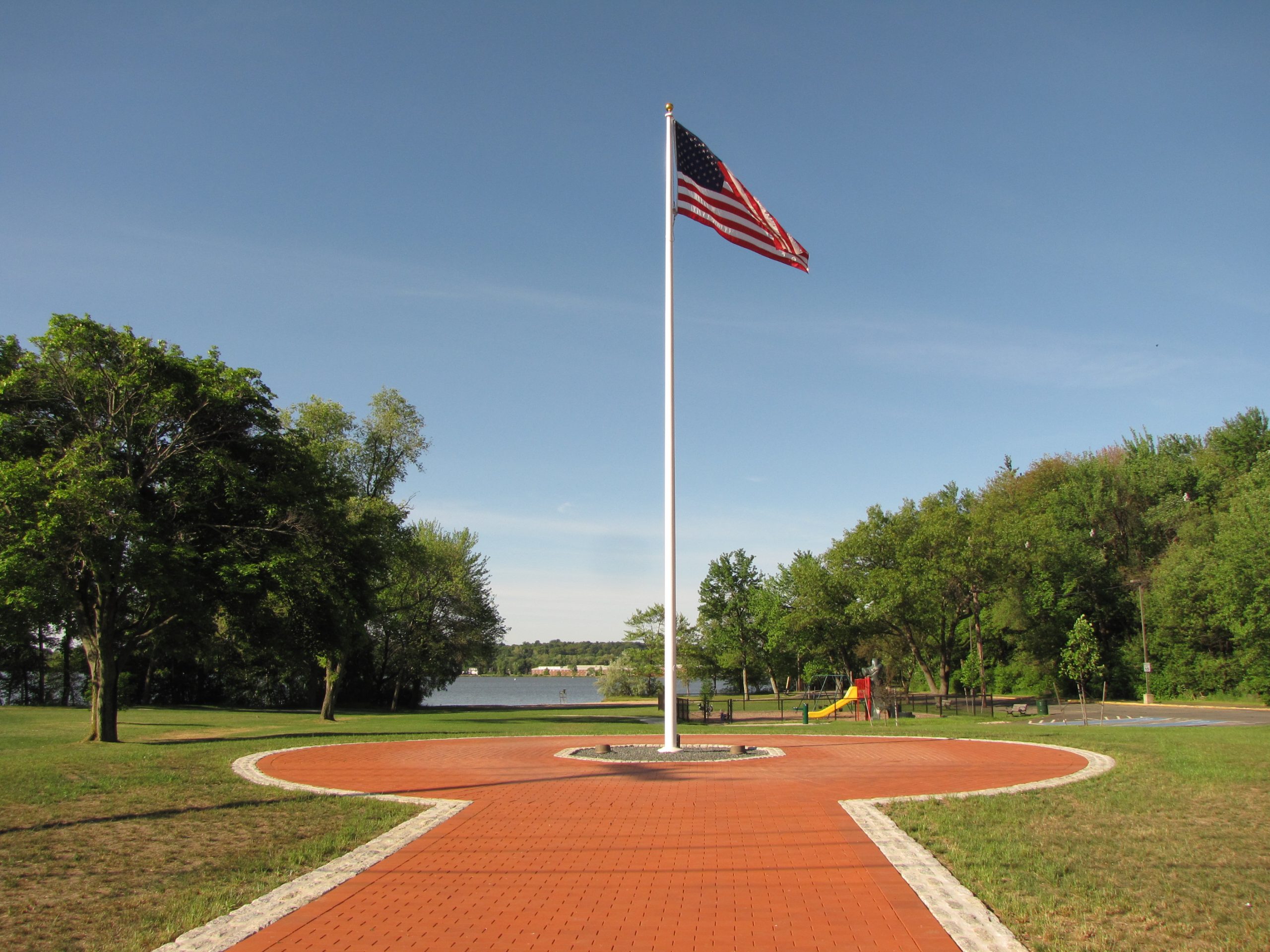 Flag pole surrounded by Bricks in Wakefield